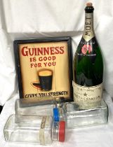 A reproduction Guinness advertising sign, an Empty 900cl Moet & Chandon  display bottle etc