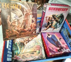 A collection of vintage board/ table top games, Runequest, Hero, Warlock and The Sorcerers game, a