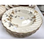 Six oriental ivory soup dishes and 2 matching dinner plates