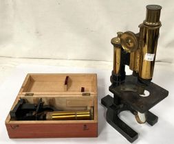 A microscope with 2 lenses by Watson & Son; a small travel microscope in wooden case