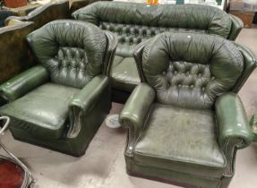 A pair of green leather effect Chesterfield style armchairs and a matching 3 seater leather style