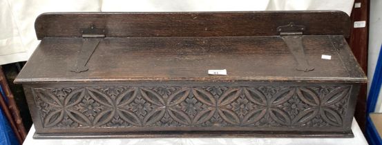 A 19th century carved oak wall handing candle box