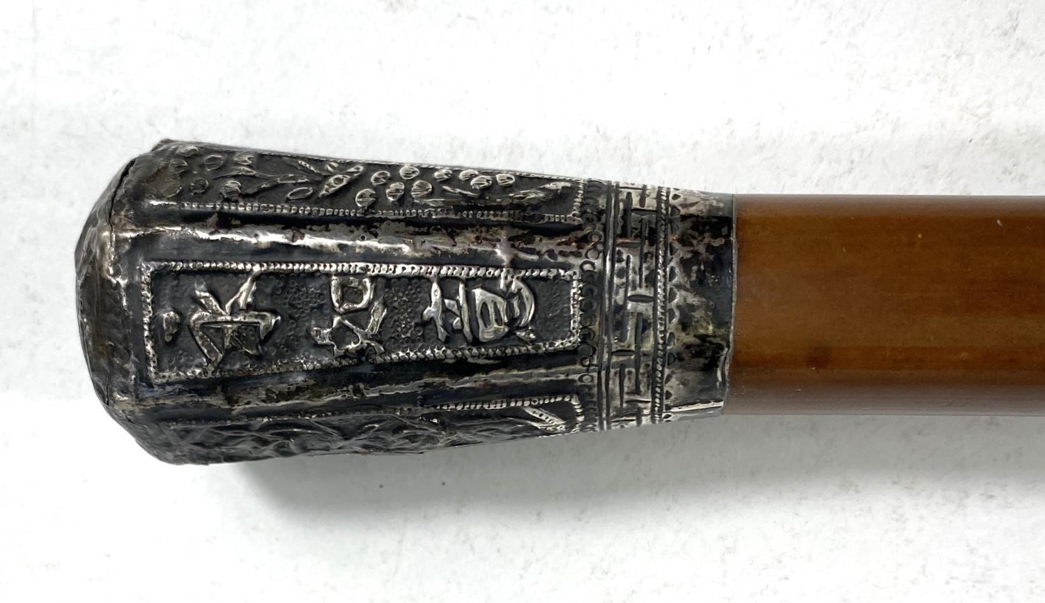A Chinese military style walking cane with white metal embossed final with plants etc - Image 2 of 6