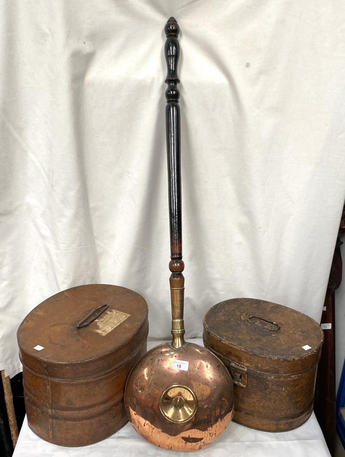 A 19th century hot water copper bed warmer; 2 19th century metal hat boxes