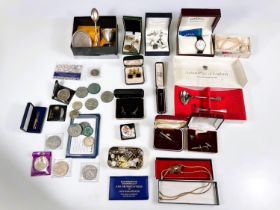 A selection of coins, spoons, cufflinks etc
