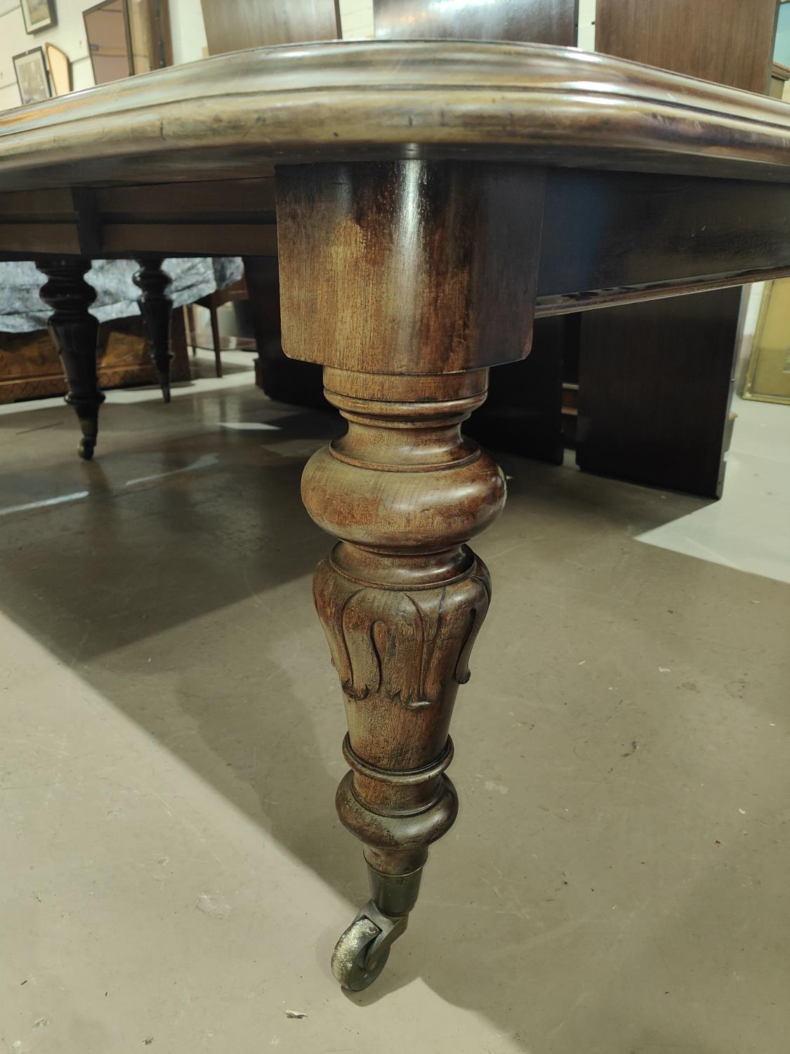 Banqueting Dining Table: A mid 19th century large and impressive rounded rectangular mahogany wind - Image 3 of 5