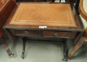 A pair of dwarf reproduction mahogany sofa/occasional tables with inset leather (one with small tear