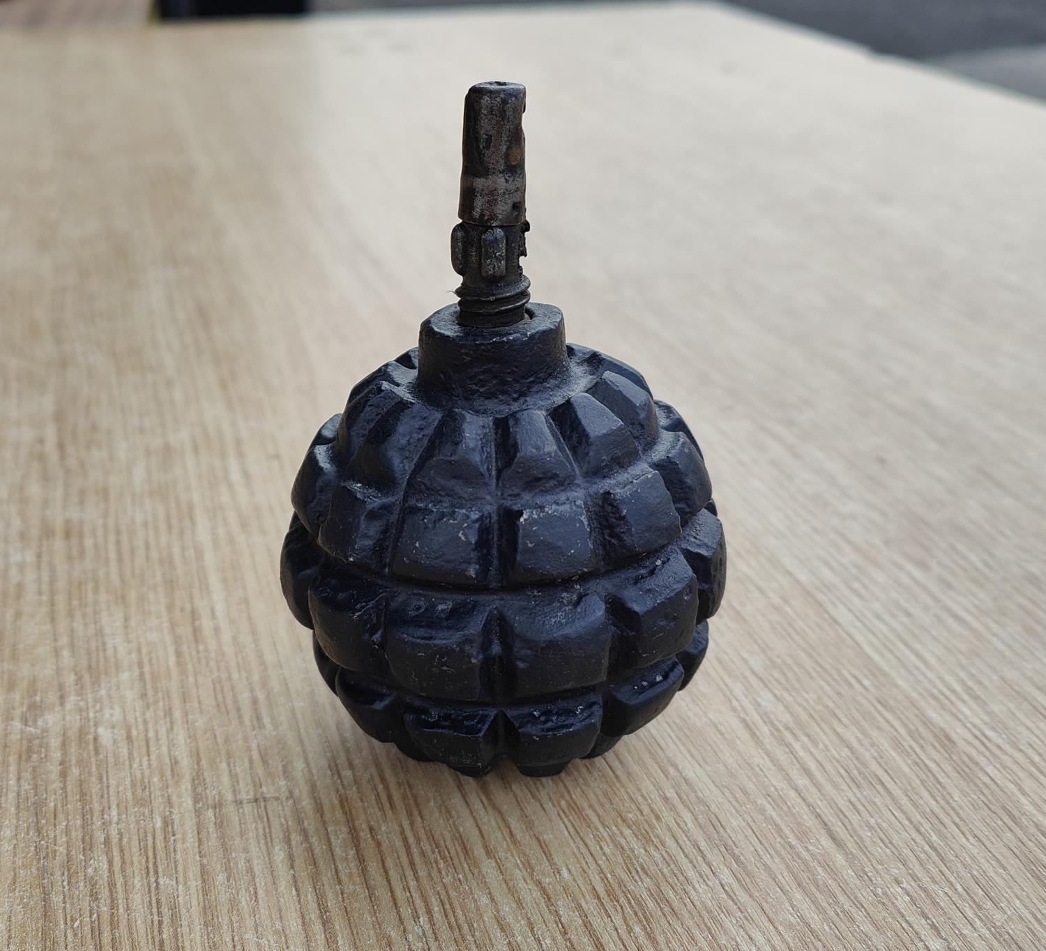 A WWI bell hand grenade (inert)