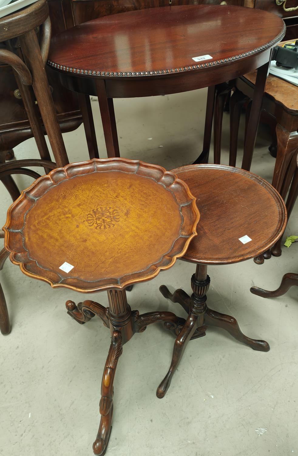 A period style oval mahogany occasional table with beaded decoration and 3 wine tables