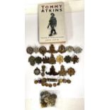 A collection of military badges and a selection of cavalry badges etc
