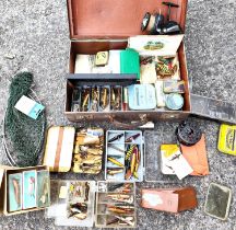 A large collection of fishing lures, tackle, ball cocks etc and two reels