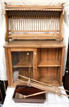 2 wall hanging pine plate racks; a 2 division cutlery tray ; a small glazed pine wall cupboard