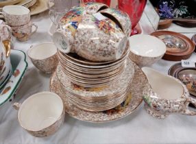 A 1930's gilt part tea set decorated with Crinoline ladies, approx. 35 pieces