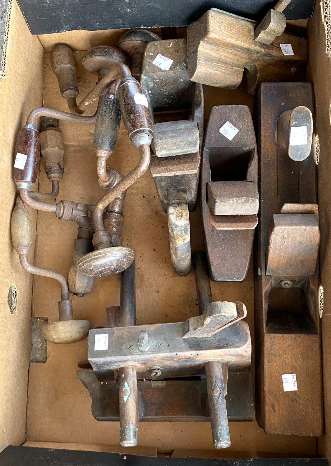 A selection of vintage coffin planes, drills etc