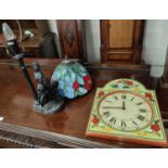 A Tiffany lamp and a painted dial wall clock