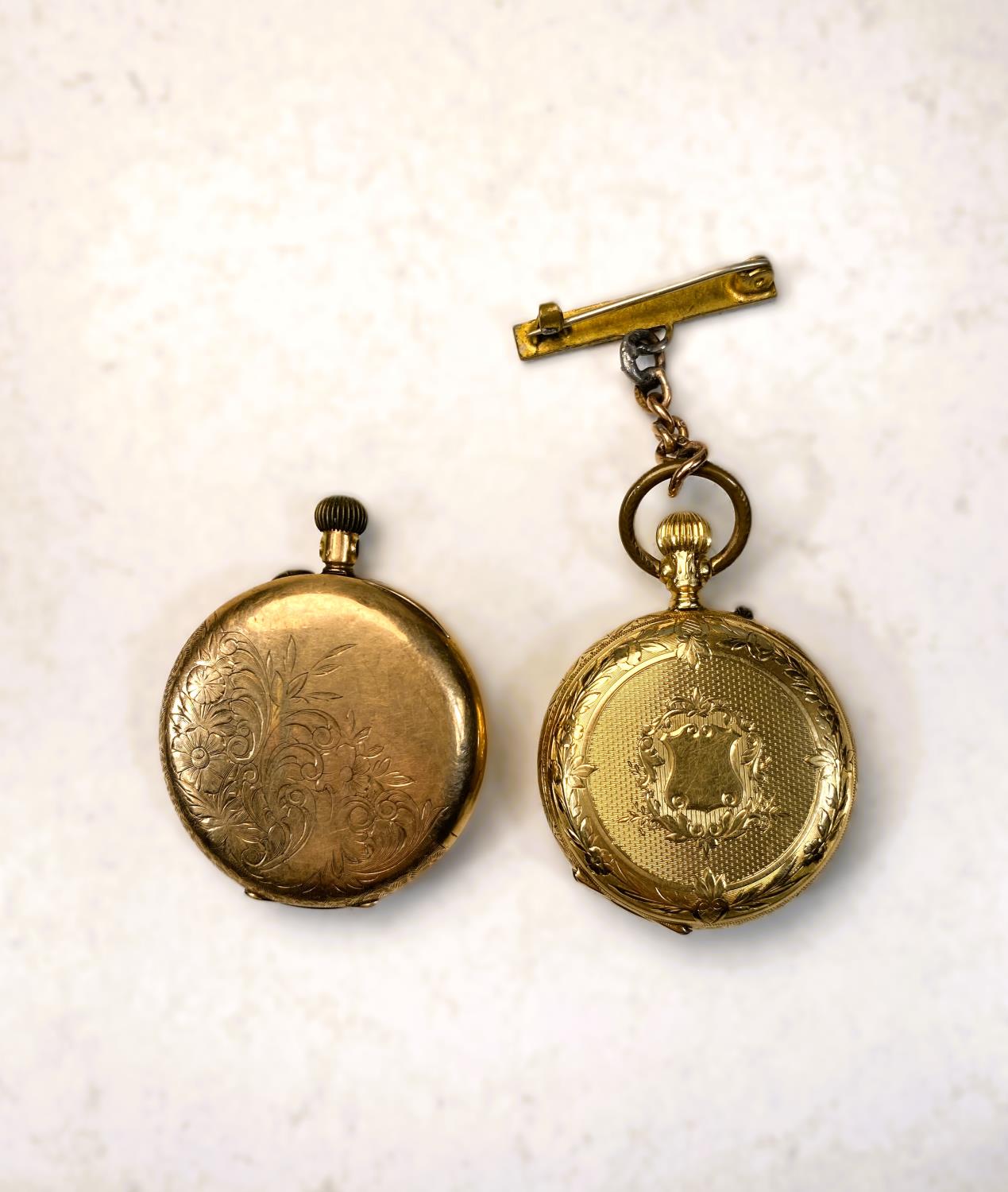 A chased yellow metal open faced keyless fob watch, the outer back case stamped 14K (a.f); a similar - Image 4 of 5