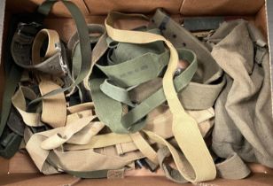A collection of military canvas pouches, webbing belts etc