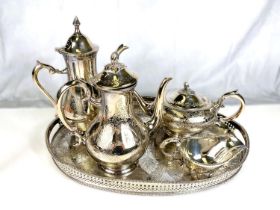 An oval silver plated gallery tray and silver plated tea/coffee pots