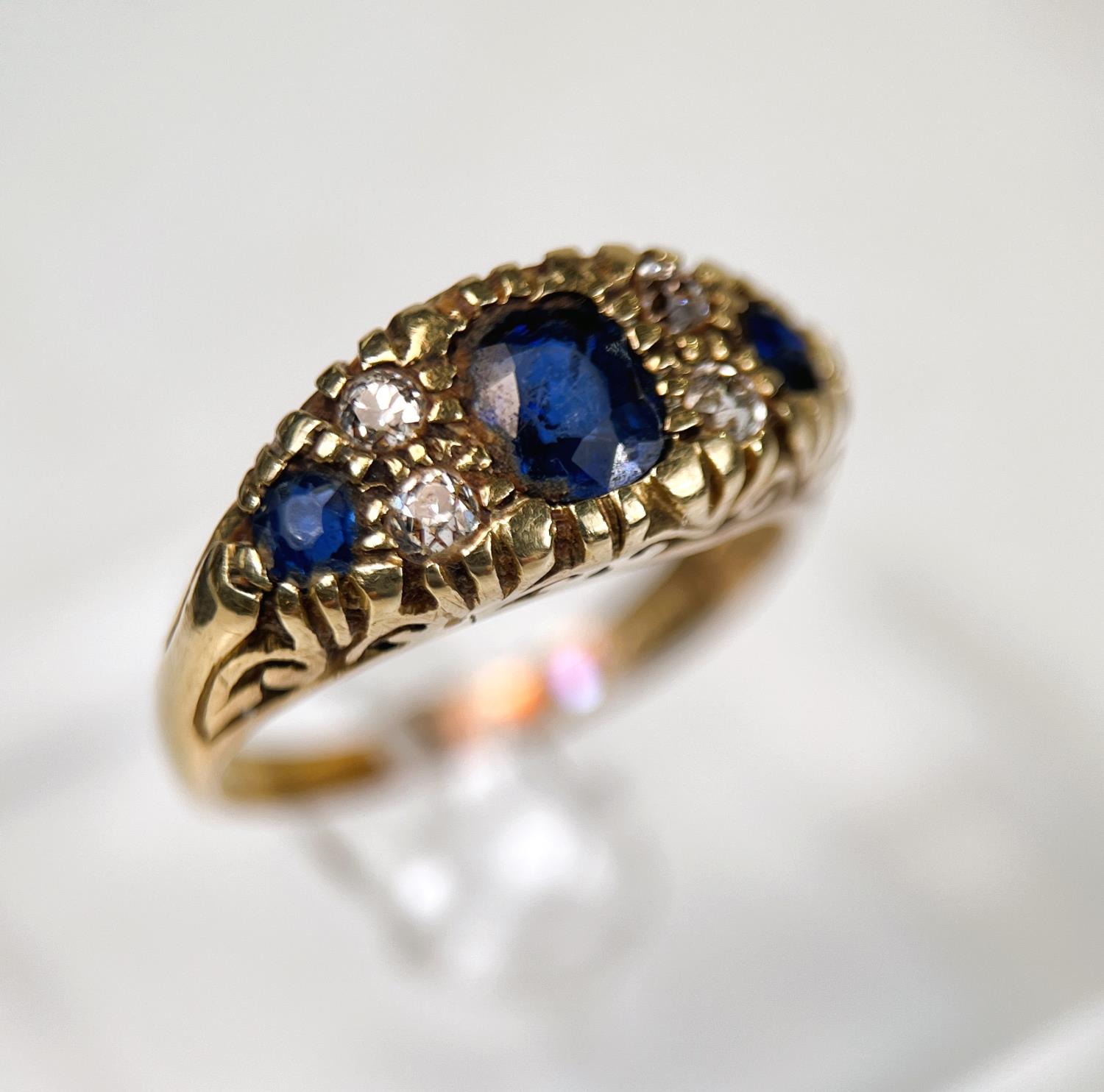 A Victorian style 18ct hallmarked gold sapphire and diamond ring, length of central stone, approx - Image 2 of 2