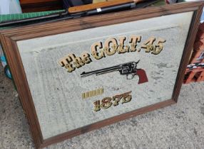 A large reproduction Colt 45 advertising mirror, 55 x 80cm