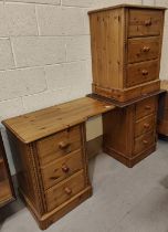 A modern pine bedroom suite comprising kneehole dressing table and mirror and 3 height chest of