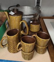 A 1970's German stoneware 15 piece coffee set and an aluminium jam pan