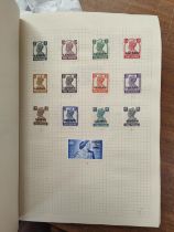 A collection of stamps in album