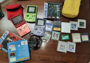 Two Nintendo Game Boy Colors, a Game Boy Advance SP, various games, Pokemon Blue, Emerald, etc