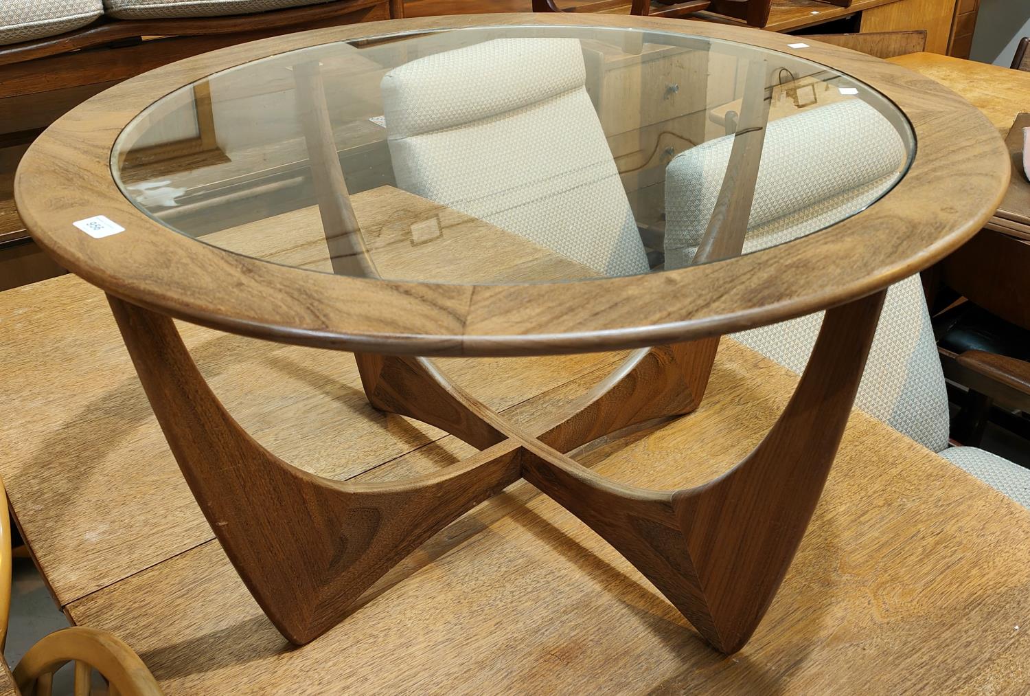 A circular 1960's G-Plan style teak coffee table