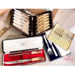 2 cased sets of silver plated servers and 2 cased sets of silver plated knives and forks; an
