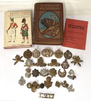A collection of military badges for various regiments etc and two hardback books