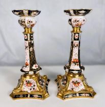 A pair of Royal Crown Derby candlesticks (1 a.f.)