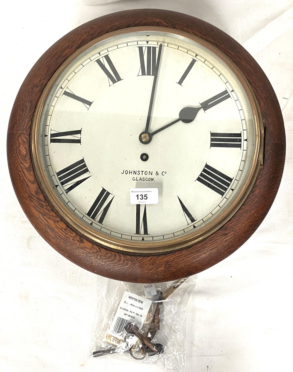 A 19th century oak wall clock with single train fusee movement by Johnston & Co, Glasgow, dia. 40cm