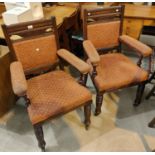A pair of Edwardian arm chairs, aesthetic movement look, cushioned upholstery