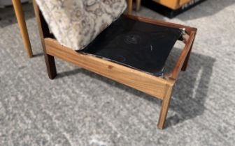 A pair of mid 20th century teak framed TV chairs (sold as design collector items only)