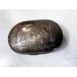 A 19th century unmarked white metal snuff boxed decorated with monogram and birds etc