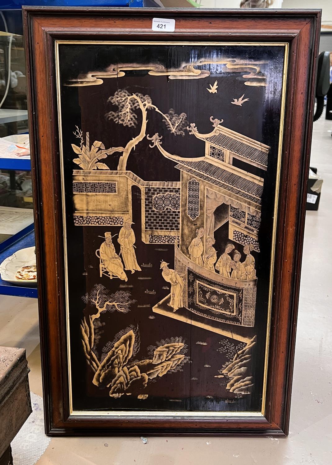 A mid 20the century Chinese lacquer panel with gilt decoration of a domestic scene