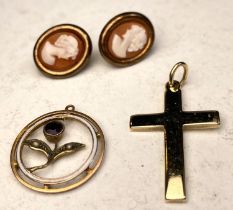 A 9 carat hallmarked gold cross; an open circular pendant with enamel inner circle and inset