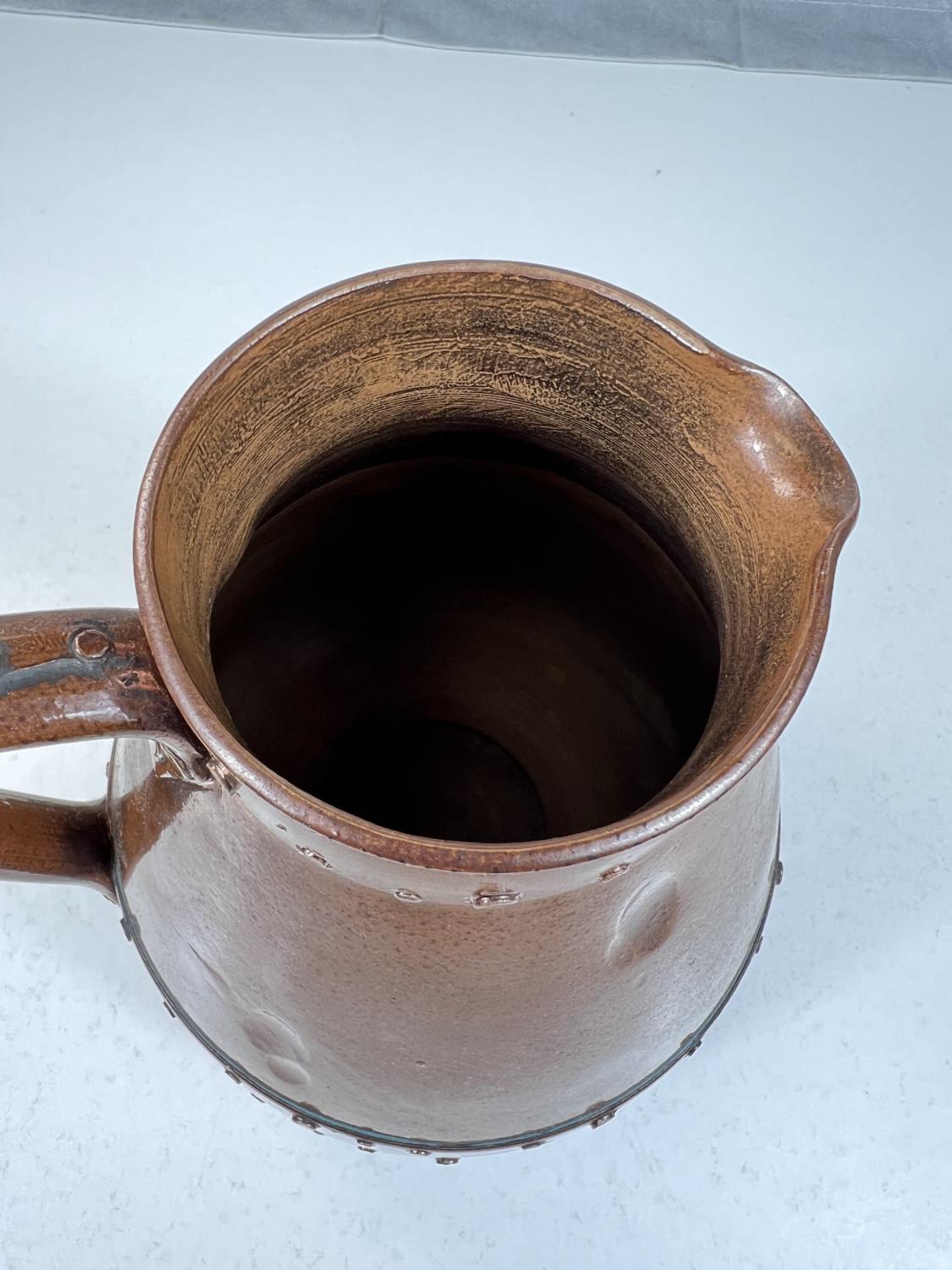 An unusual Arts & Crafts jug by Doulton Silicon in copper coloured finish with rivet decoration, ht. - Image 3 of 5