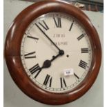 A 19th century mahogany cased wall clock with circular dial by J Hicks, Stockport