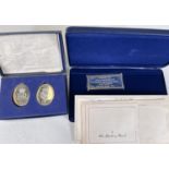 A Danbury Mint "QEII Silver Jubilee Tour" hallmarked silver block; a boxed pair of hallmarked silver