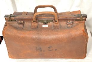 A large leather Gladstone bag