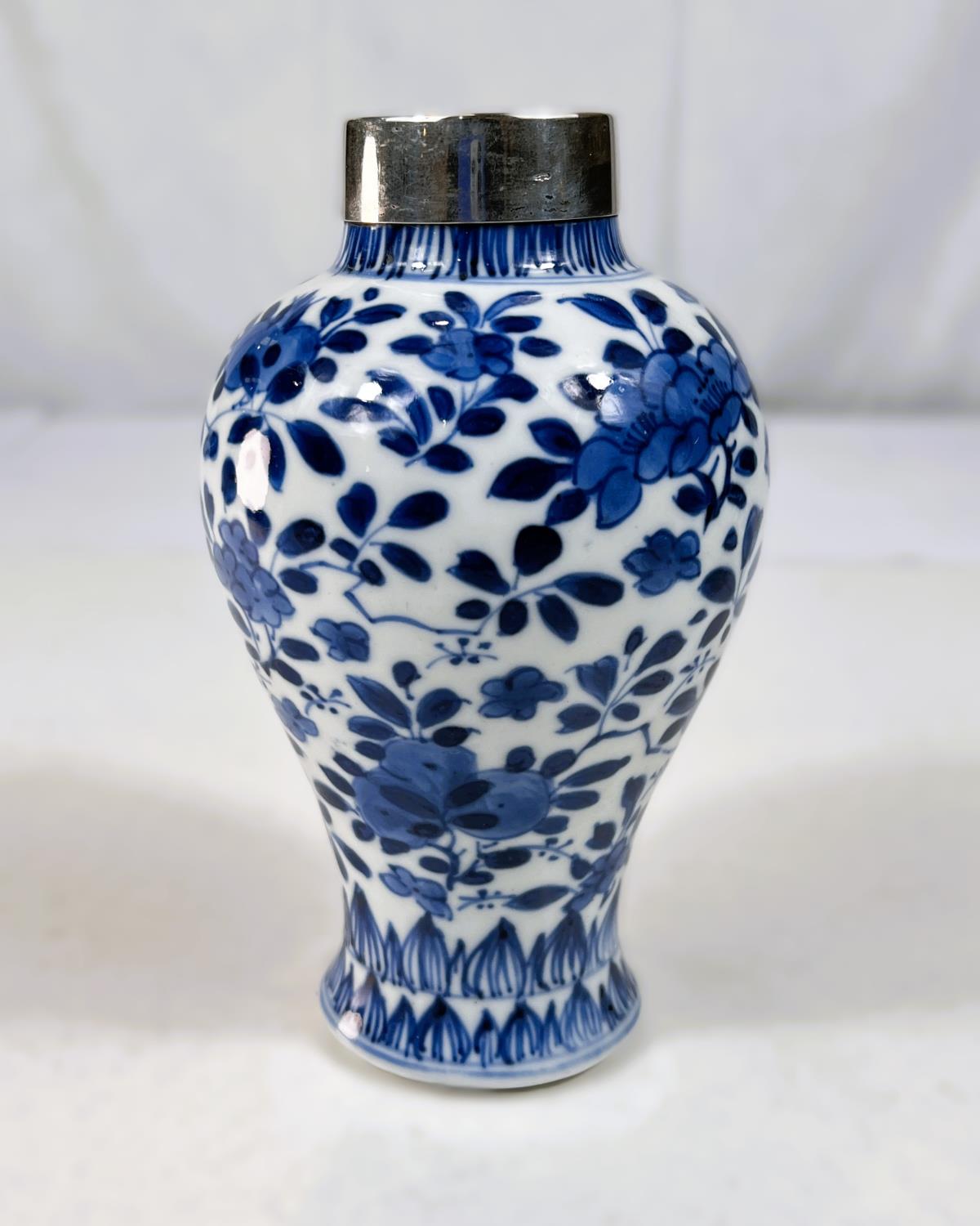 A Chinese Kangxi period blue and white vase with applied silver rim (neck does not appear to be