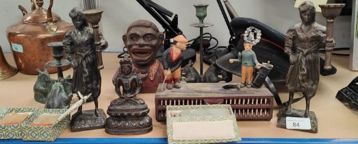 A bronze buddha figure, a novelty money box golf related; 2 bronze candlesticks