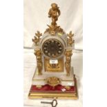 A Louis XVI style white marble mantle clock with gilt metal cherub finial and mounts with base and