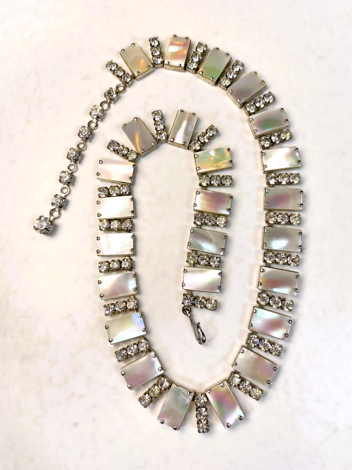 A mid 20th century cocktail necklace formed from rectangular pieces of mother of pearl, each