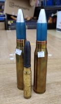 Two post WWII 30mm brass cased shells, 26cm length and a 1944 K2 20mm round