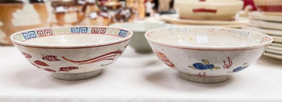 A pair of Chinese bowls and another