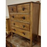 A 1930's oak chest of drawers of 3 long and 2 short drawers