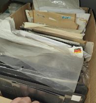 Two boxes of World stamps in albums and on sheets etc